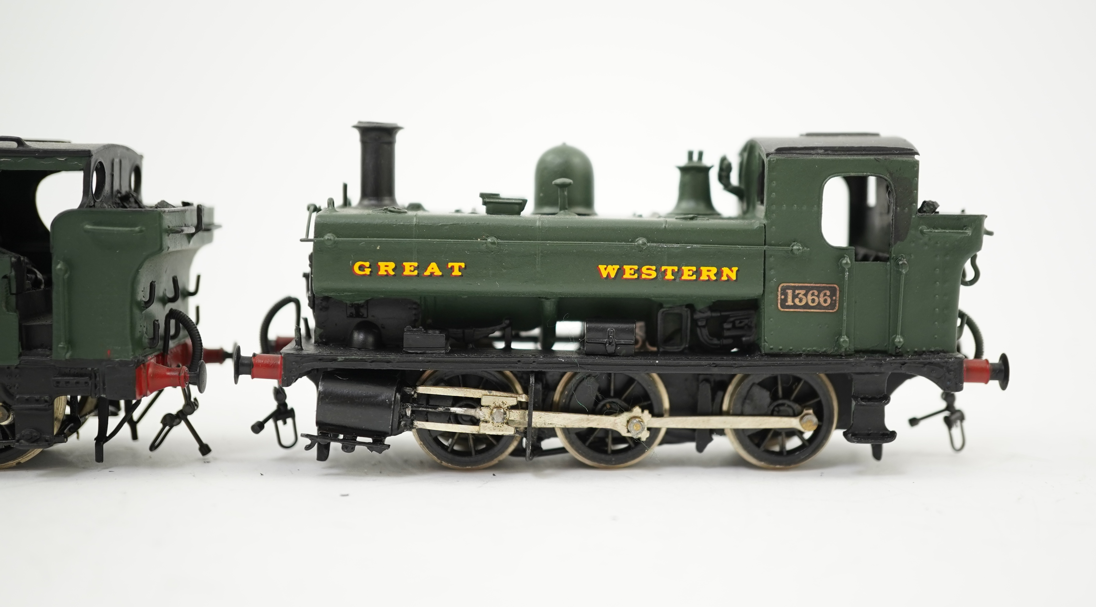 Two 00 gauge brass and white metal kit built GWR tank locomotives; a 1400 class 2-4-0T, 1458, together with an 1366 class 0-6-0PT, 1366, constructed, painted and lined to a high standard, both motored for two rail operat